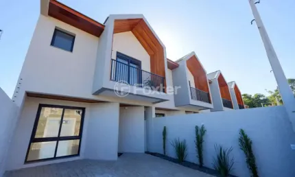 Casa em condomínio fechado com 3 quartos à venda na Rua Professora Delphina Ferrari, 236, Igara, Canoas, 124 m2 por R$ 720.000