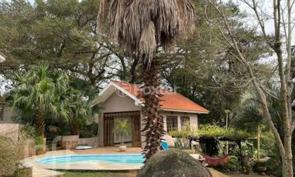 Casa com 5 quartos à venda na Rua dos Guaranis, 390, Espírito Santo, Porto Alegre, 218 m2 por R$ 995.000