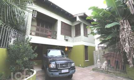 Casa com 4 quartos à venda na Rua Estácio de Sá, 76, Chácara das Pedras, Porto Alegre, 420 m2 por R$ 2.250.000