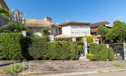 Casa com 4 quartos à venda na Rua José Otávio Manica, 80, Santa Tereza, Porto Alegre, 442 m2 por R$ 1.699.000