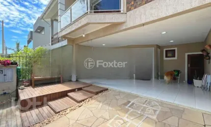 Casa com 3 quartos à venda na Rua Guatambu, 618, Hípica, Porto Alegre, 254 m2 por R$ 790.000
