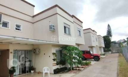 Casa em condomínio fechado com 2 quartos à venda na Rua Cangussu, 329, Nonoai, Porto Alegre, 74 m2 por R$ 329.000