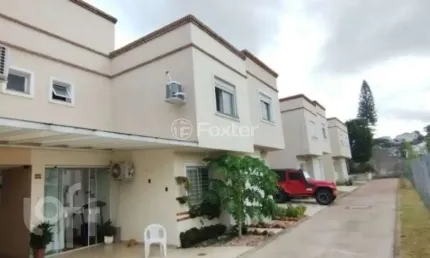 Casa em condomínio fechado com 2 quartos à venda na Rua Cangussu, 329, Nonoai, Porto Alegre, 74 m2 por R$ 329.000