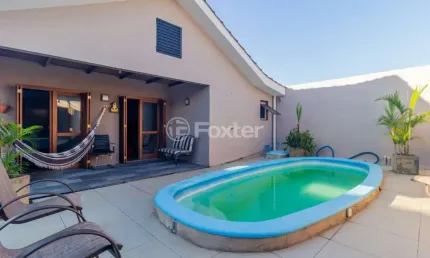 Casa com 3 quartos à venda na Rua Doutor Mário Totta, 3051, Tristeza, Porto Alegre, 125 m2 por R$ 629.000