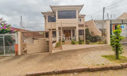 Casa com 4 quartos à venda na Rua Bartolomeu Dias, 492, Jardim Itu Sabará, Porto Alegre, 348 m2 por R$ 1.900.000