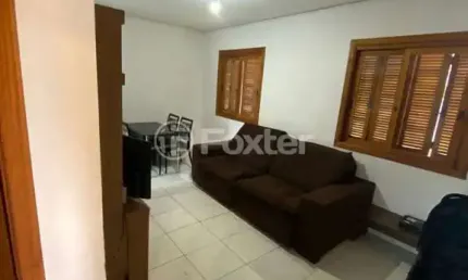 Casa em condomínio fechado com 2 quartos à venda na Rua das Espatódeas, 340, Ponta Grossa, Porto Alegre, 94 m2 por R$ 161.500