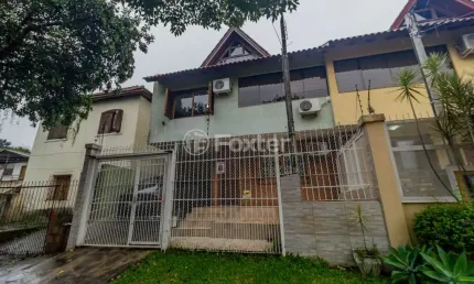 Casa com 4 quartos à venda na Rua Monte Flor, 291, Jardim Floresta, Porto Alegre, 160 m2 por R$ 550.000
