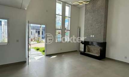 Casa em condomínio fechado com 3 quartos à venda na Estrada Caminho do Meio, 2815, Cocão, Viamão, 94 m2 por R$ 550.000