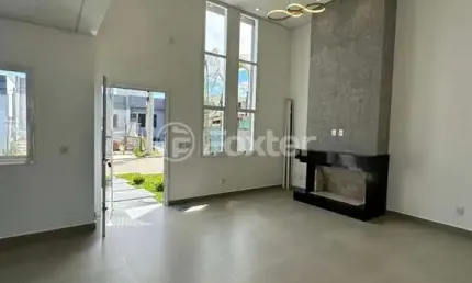 Casa em condomínio fechado com 3 quartos à venda na Estrada Caminho do Meio, 2815, Cocão, Viamão, 94 m2 por R$ 550.000