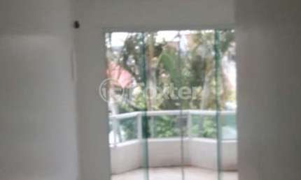 Casa com 3 quartos à venda na Rua Samuel Wainstein, 201, Hípica, Porto Alegre, 208 m2 por R$ 636.000