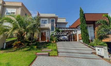 Casa em condomínio fechado com 3 quartos à venda na Avenida Senador Salgado Filho, 8500, Querência, Viamão, 205 m2 por R$ 1.490.000