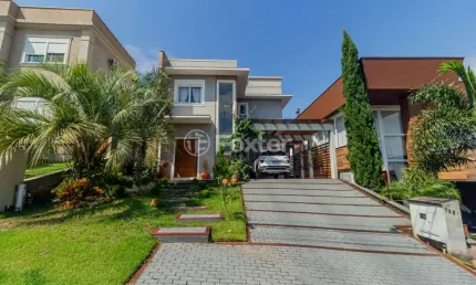 Casa em condomínio fechado com 3 quartos à venda na Avenida Senador Salgado Filho, 8500, Querência, Viamão, 205 m2 por R$ 1.490.000