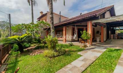 Casa em condomínio fechado com 3 quartos à venda na Rua Pitangueiras, 169, São Lucas, Viamão, 167 m2 por R$ 855.000