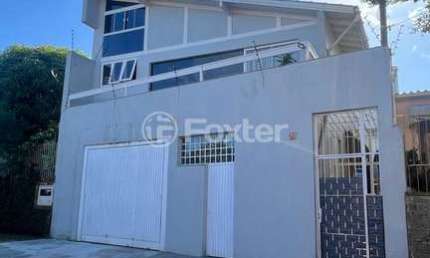Casa com 3 quartos à venda na Rua João Corrêa Almeida, 70, Vila Nova, Porto Alegre, 142 m2 por R$ 490.000