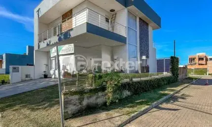 Casa em condomínio fechado com 3 quartos à venda na Estrada Caminho do Meio, 2771, Cocão, Viamão, 158 m2 por R$ 755.000