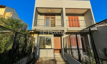 Casa em condomínio fechado com 2 quartos à venda na Rua Attilio Bettio, 53, Aberta dos Morros, Porto Alegre, 136 m2 por R$ 376.000