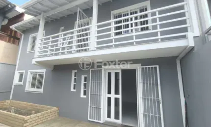 Casa com 3 quartos à venda na Rua Luís Linck Barcelos, 35, Loteamento Jardim Timbaúva, Gravataí, 164 m2 por R$ 372.500