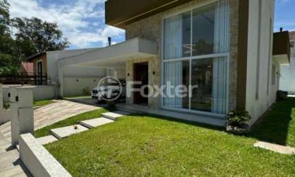Casa em condomínio fechado com 3 quartos à venda na Rua Pedro Arnimo Rech, 125, Lomba do Pinheiro, Porto Alegre, 181 m2 por R$ 990.000