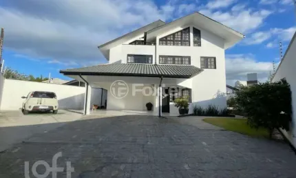 Casa com 4 quartos à venda na Rua Dário Nicodemos de Oliveira, 131, Centro, Palhoça, 200 m2 por R$ 1.800.000