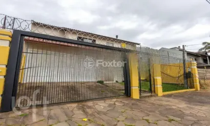 Casa com 4 quartos à venda na Rua das Petúnias, 277, Estância Velha, Canoas, 182 m2 por R$ 989.000