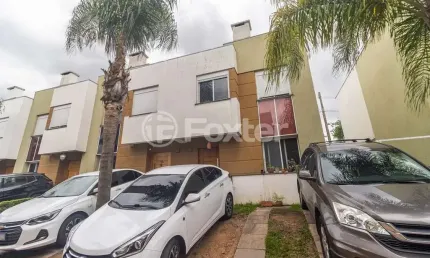 Casa em condomínio fechado com 3 quartos à venda na Rua Alberto Jerônimo Guerra, 20, Mário Quintana, Porto Alegre, 172 m2 por R$ 569.000