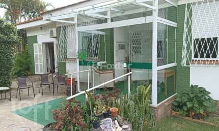 Casa com 5 quartos à venda na Avenida Cinco de Novembro, 56, Teresópolis, Porto Alegre, 250 m2 por R$ 1.350.000