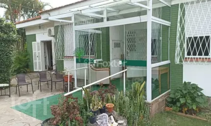 Casa com 5 quartos à venda na Avenida Cinco de Novembro, 56, Teresópolis, Porto Alegre, 250 m2 por R$ 1.350.000
