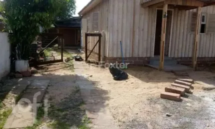 Casa com 4 quartos à venda na Rua Guaporé, 47, Mathias Velho, Canoas, 100 m2 por R$ 636.000