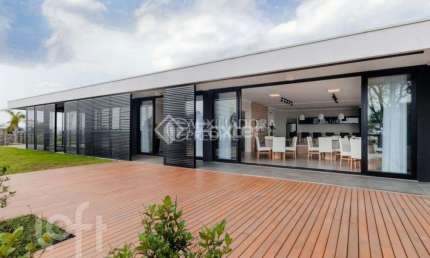 Casa em condomínio fechado com 3 quartos à venda na Rua Tancredo Neves, 992, Jansen, Gravataí, 106 m2 por R$ 790.000