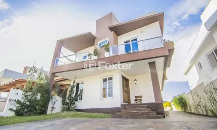 Casa em condomínio fechado com 3 quartos à venda na Avenida Edgar Pires de Castro, 540, Hípica, Porto Alegre, 186 m2 por R$ 990.000