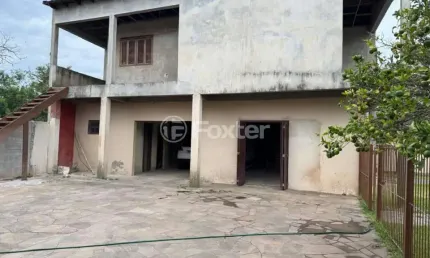 Casa com 4 quartos à venda na Rua Japeju, 39, Arquipélago, Porto Alegre, 180 m2 por R$ 1.235.000