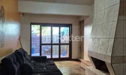 Casa com 3 quartos à venda na Rua Doutor Affonso Sanmartin, 449, Jardim do Salso, Porto Alegre, 150 m2 por R$ 380.000