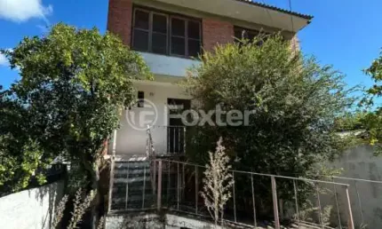 Casa com 2 quartos à venda na rua águas mortas, 71, medianeira, porto alegre, 245 m2 por r$ 450.000