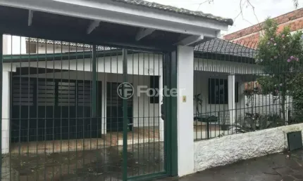 Casa com 3 quartos à venda na Rua Venâncio Aires, 302, Canudos, Novo Hamburgo, 191 m2 por R$ 403.750