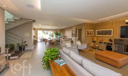 Casa em condomínio fechado com 3 quartos à venda na rua ivo walter kern, 599, hípica, porto alegre, 270 m2 por r$ 1.690.000