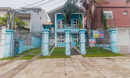 Casa com 3 quartos à venda na Rua Osmindo Júlio Kuhn, 369, Parque Santa Fé, Porto Alegre, 400 m2 por R$ 750.500