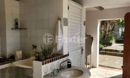 Casa com 4 quartos à venda na Rua Itaboraí, 230, Jardim Botânico, Porto Alegre, 180 m2 por R$ 1.050.000