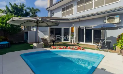 Casa com 3 quartos à venda na Rua Nilton Salgado Pereira, 46, Jardim Itu Sabará, Porto Alegre, 338 m2 por R$ 1.850.000
