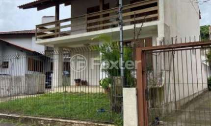 Casa com 3 quartos à venda na Rua Miracema, 449, Chácara das Pedras, Porto Alegre, 235 m2 por R$ 950.000