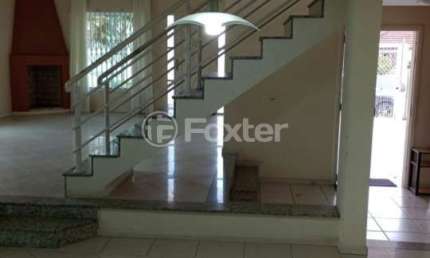 Casa com 4 quartos à venda na Rua Ipê Rosa, 601, Carianos, Florianópolis, 256 m2 por R$ 1.150.000