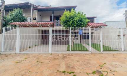 Casa com 4 quartos à venda na Rua Carlos Gomes, 237, Harmonia, Canoas, 212 m2 por R$ 920.000