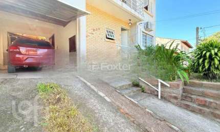 Casa com 4 quartos à venda na Rua Jóia, 220, Vila Nova, Porto Alegre, 200 m2 por R$ 520.000