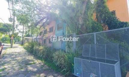 Casa em condomínio fechado com 2 quartos à venda na Rua Ângelo Crivellaro, 105, Jardim do Salso, Porto Alegre, 68 m2 por R$ 250.000