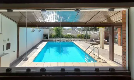 Casa com 4 quartos à venda na Rua Carlos Huber, 826, Três Figueiras, Porto Alegre, 318 m2 por R$ 1.616.000