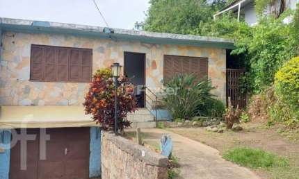 Casa com 2 quartos à venda na Rua Agulhas Negras, 106, Coronel Aparício Borges, Porto Alegre, 200 m2 por R$ 250.000