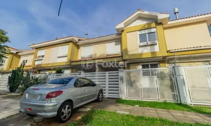 Casa em condomínio fechado com 3 quartos à venda na Rua Cangussu, 680, Nonoai, Porto Alegre, 130 m2 por R$ 495.000