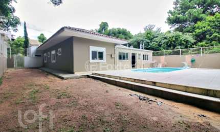 Casa em condomínio fechado com 4 quartos à venda na Rua Professor Bolívar Fontoura, 450, Vila Nova, Porto Alegre, 220 m2 por R$ 1.290.000