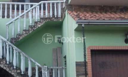 Casa com 3 quartos à venda na Avenida Tiradentes, 378, Aparecida, Alvorada, 279 m2 por R$ 500.000