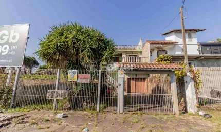 Casa com 3 quartos à venda na Avenida Tiradentes, 378, Aparecida, Alvorada, 279 m2 por R$ 500.000