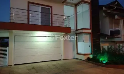 Casa em condomínio fechado com 4 quartos à venda na Rua Antônio Ramos, 40, Loteamento Jardim Timbaúva, Gravataí, 268 m2 por R$ 930.000